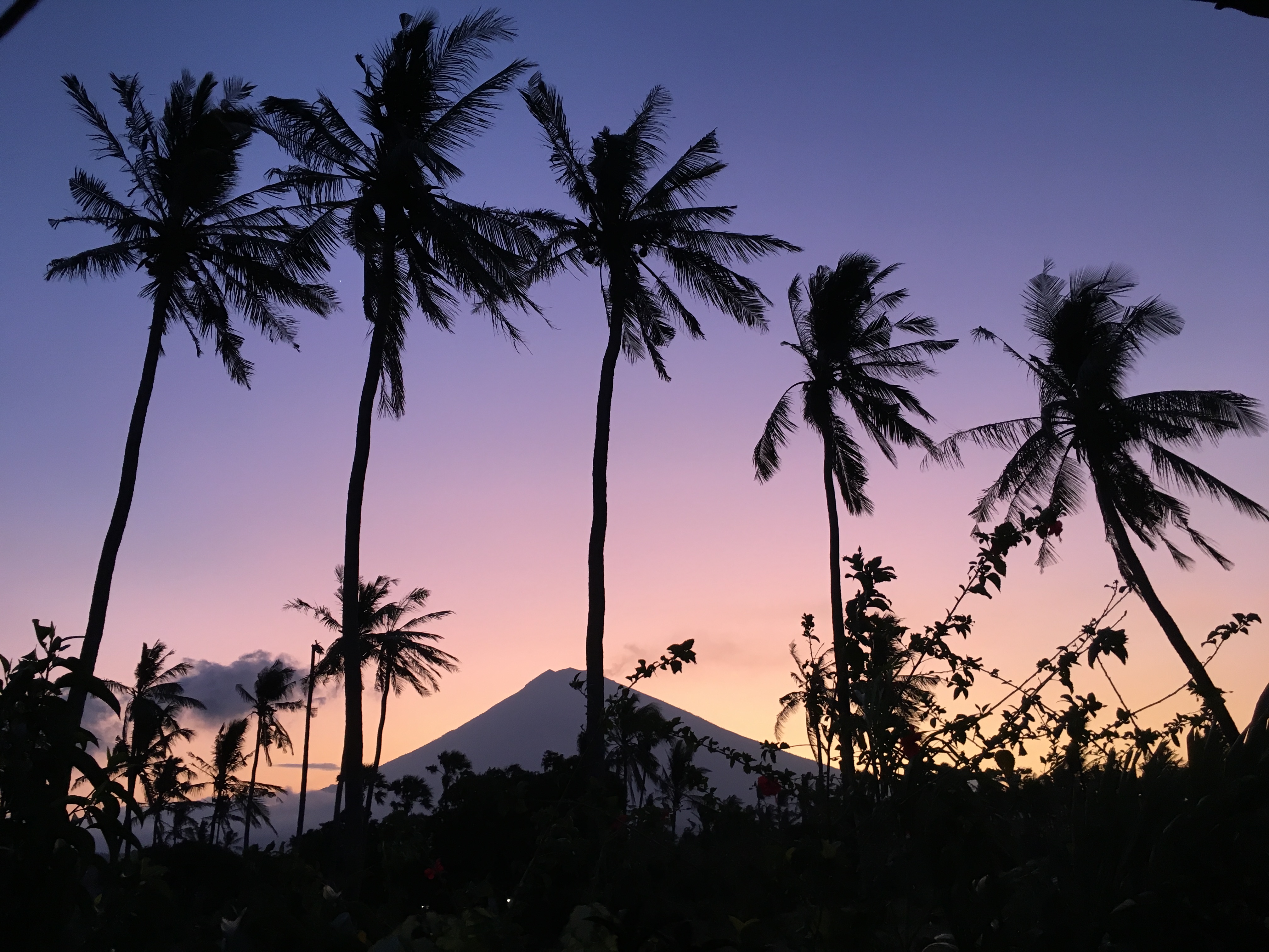 Beautiful sunset behind Mt. Agung in Amed Bali